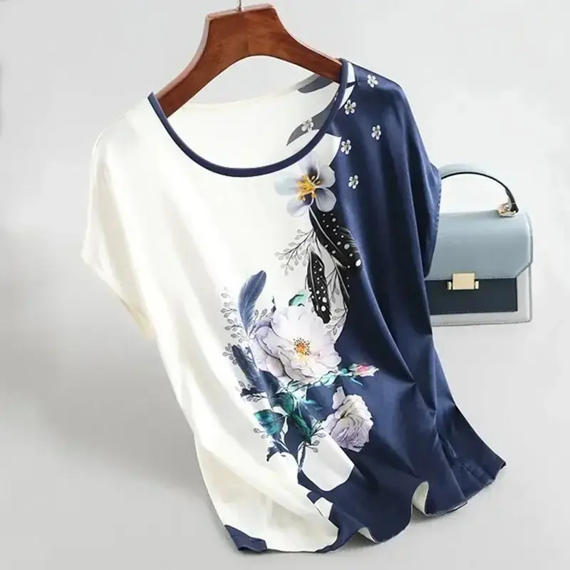 Silk satin blouse for plus-size women featuring a delicate floral print. Designed for spring and summer, this elegant top blends fashion and comfort seamlessly | US $3.25