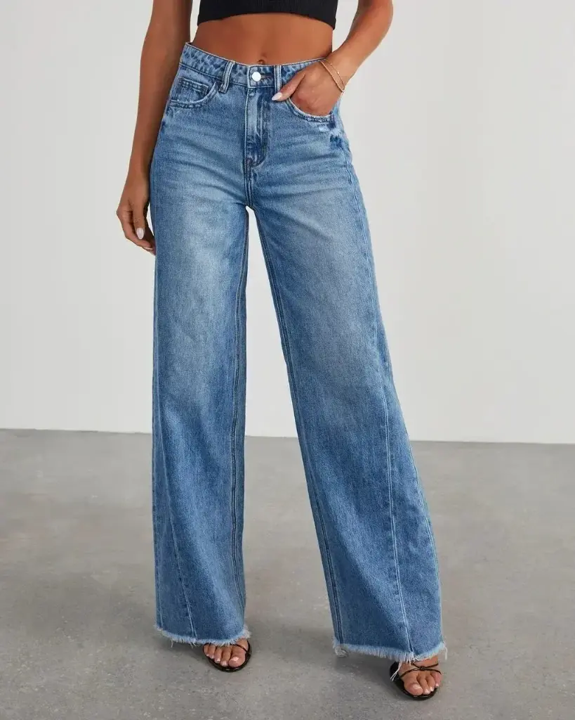 Add a fresh touch to your spring and summer wardrobe with these new women's jeans. Designed in a solid color, they feature a loose wide-leg fit, side seam stitching, and a frayed hem for a stylish and relaxed look | US $6.93