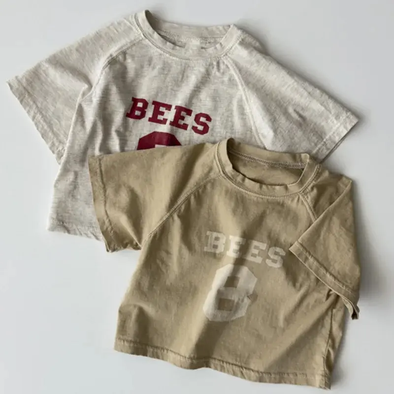 2025 Summer New Baby Short Sleeve T-Shirts for Boys and Girls. Fashionable letter print design, loose fit, and made from soft cotton. Perfect tops for kids and infants.

 | US $5.46