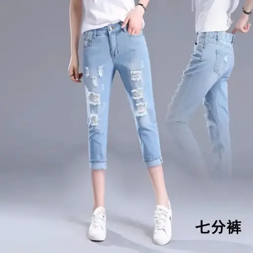 Refresh your casual wardrobe with these women's broken jeans, featuring an elastic waistband for ultimate comfort. Designed with a loose fit and a relaxed Harlan style, these versatile pants add a playful edge to your everyday look | US $13.34