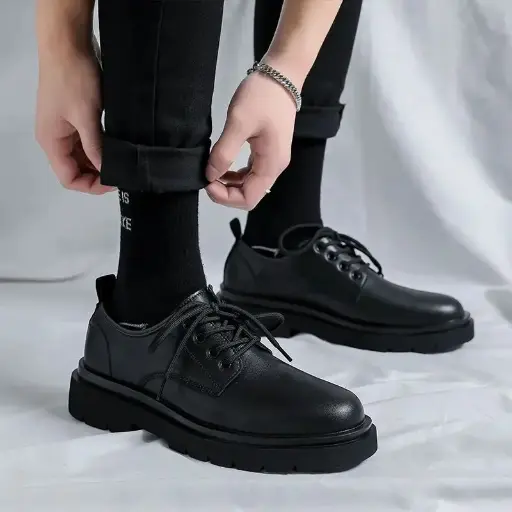Step into comfort and style with these  leather men’s sneakers. Designed with waterproof, non-slip features and a thick sole, these black business dress sneakers are perfect for both casual and formal occasions | US $10.05